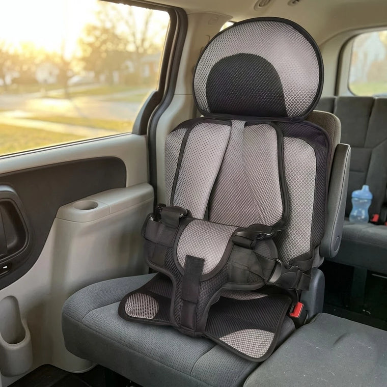 BOLTHUT portable travel seat set up on a sunlit car back seat