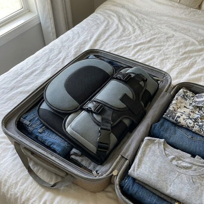 Travel car seat folded flat inside a suitcase