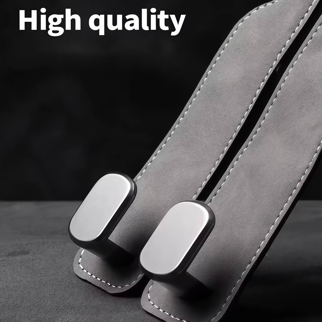 Gray car seat belt with metal buckle on a dark background, labeled 'High quality'.