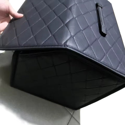 Space-saving storage box for the car trunk