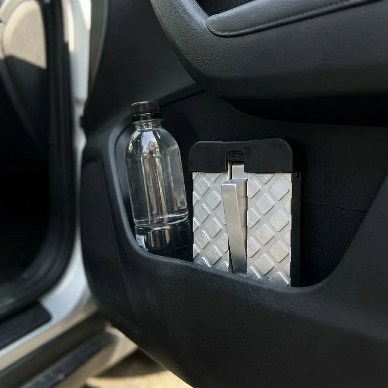 BOLTHUT door step folded and stored in a car door pocket