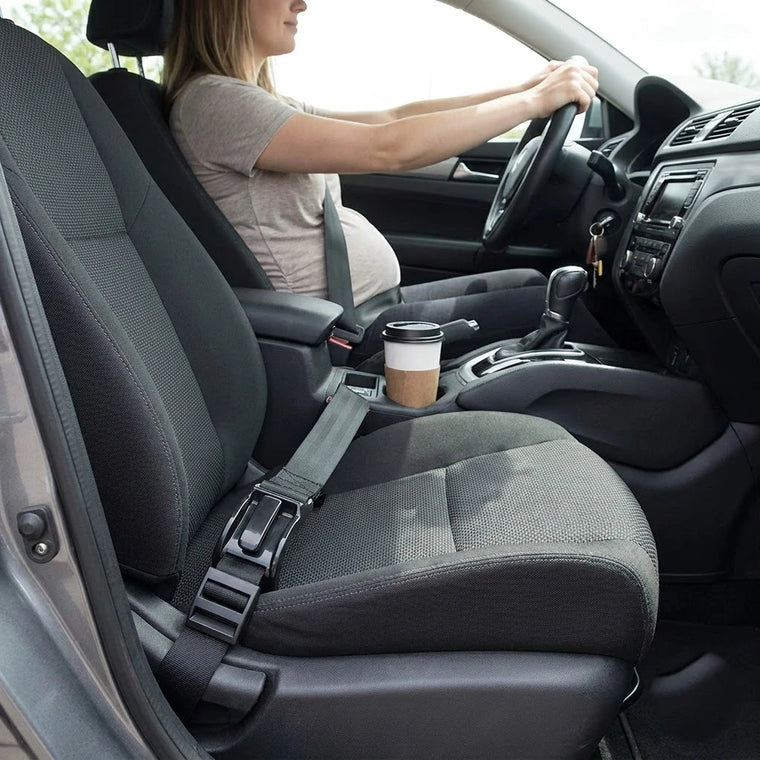 Pregnant driver comfortable with the seat belt adjuster fitted low