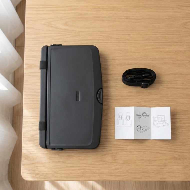 A BOLTHUT folding tray table with its headrest straps and quick-fit guide