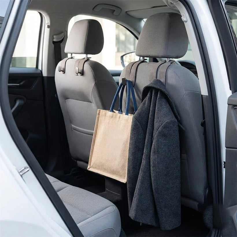 Bags hung neatly on BOLTHUT leather headrest hooks