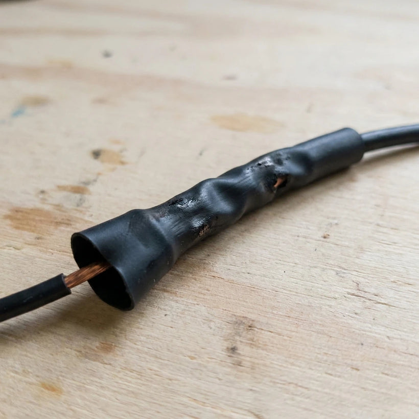 Unevenly heated scorched heat-shrink tubing