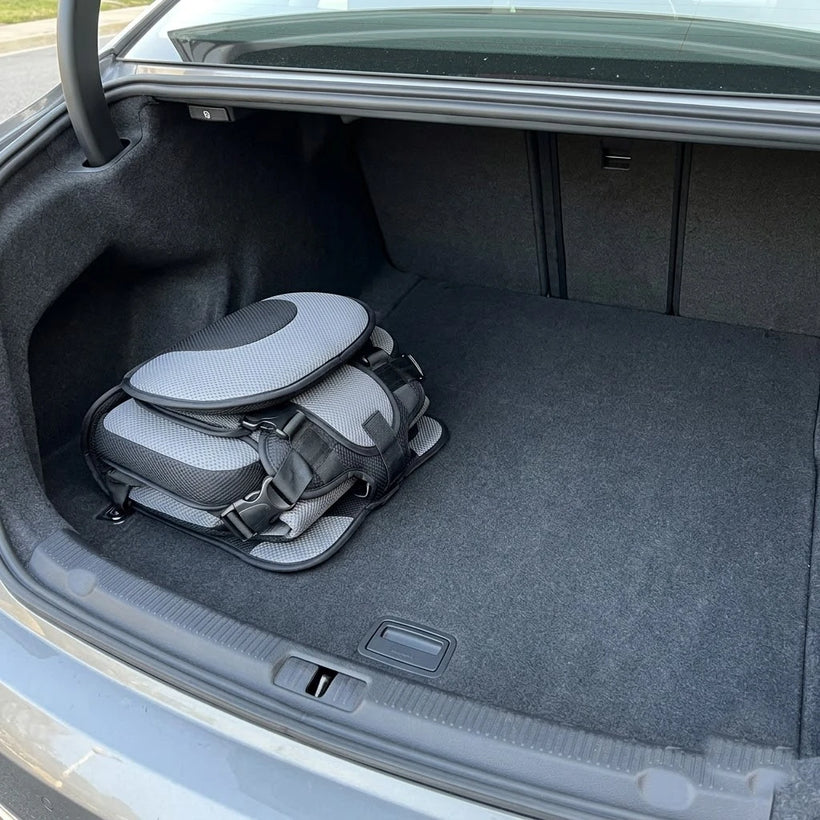 Same trunk with the folded BOLTHUT travel seat and room to spare
